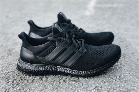 Adidas triple black shoes